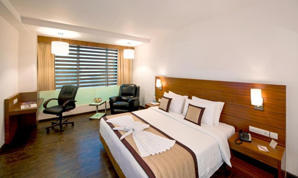 Hotel Sandy'S Tower Bhubaneswar Rom bilde